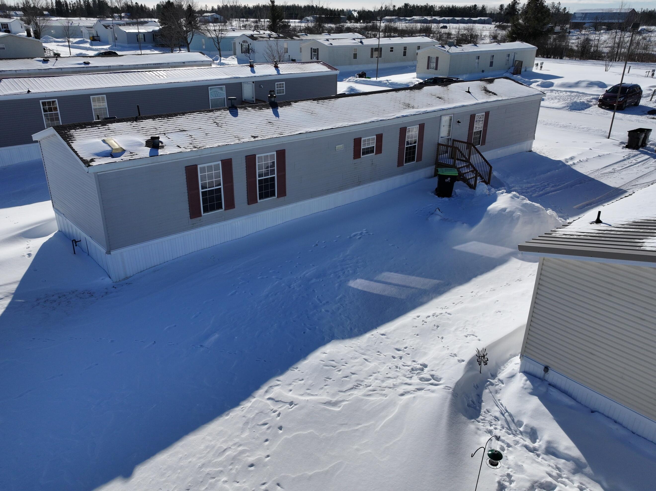 54 Chelsey Lane Cheboygan, MI 49721 - Photo 4 of 18 dji_fly_20260129_143618_0253_17702514565