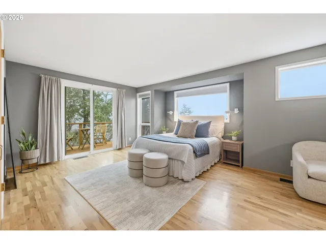 a front view of a house with a yard table and chairs