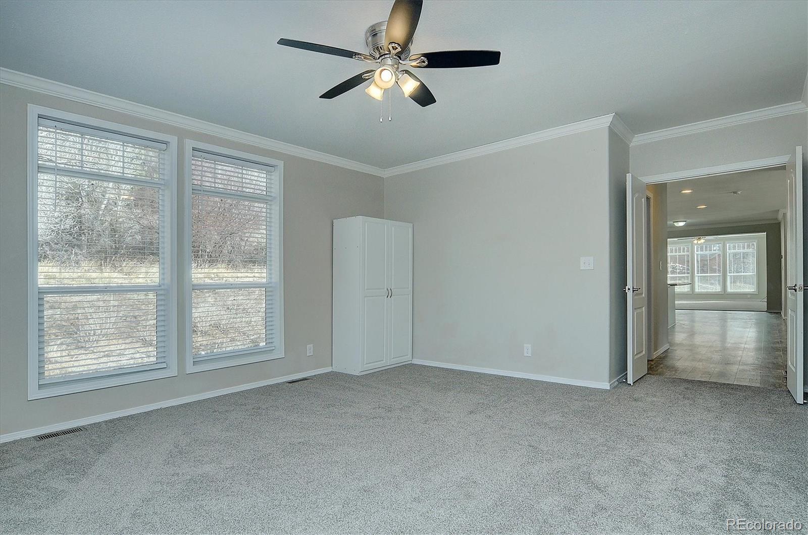 16554 Rocky Mountain Road Salida, CO 81201 - Photo 26 of 33 a view of empty room with ceiling fan