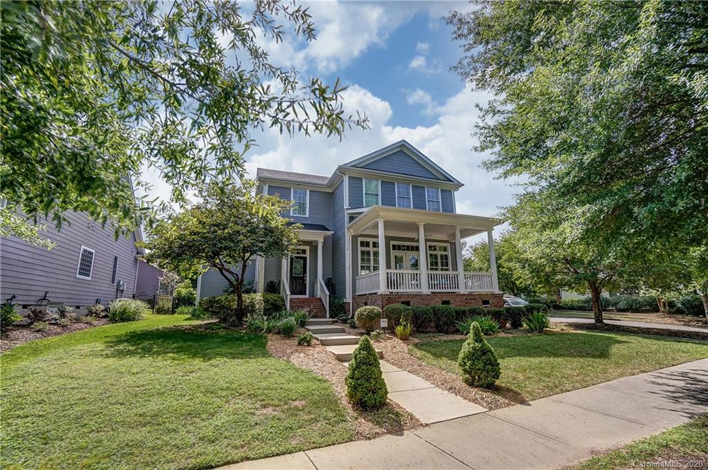 718 Revival Row Fort Mill, SC 29708 - Photo 1 of 47 a front view of a house with a yard
