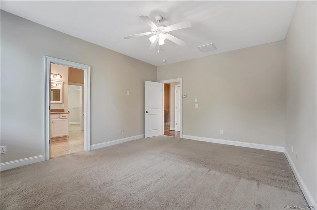 718 Revival Row Fort Mill, SC 29708 - Photo 29 of 47 a view of an empty room with a ceiling fan