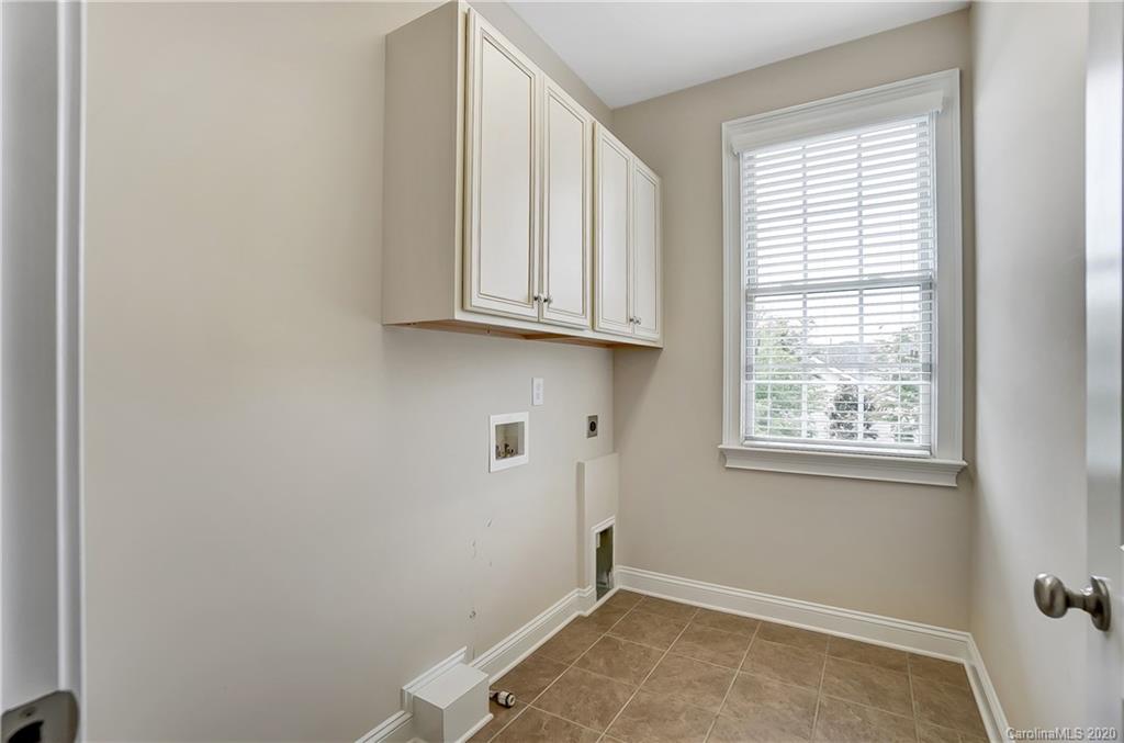718 Revival Row Fort Mill, SC 29708 - Photo 41 of 47 wooden floor in an empty room with a window