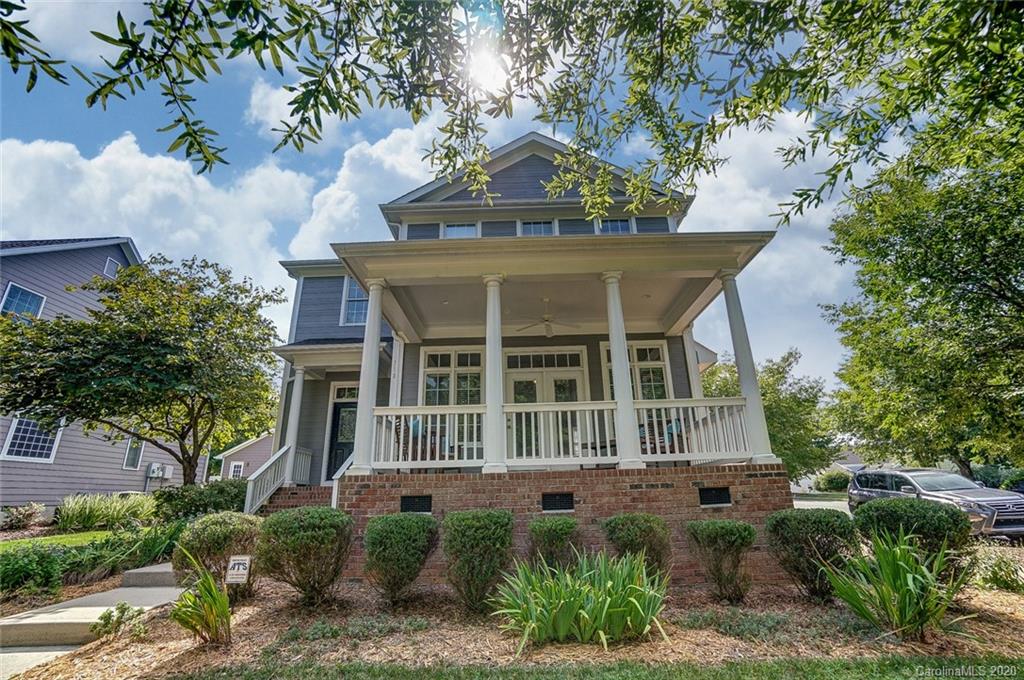 718 Revival Row Fort Mill, SC 29708 - Photo 45 of 47 a front view of a house with a garden