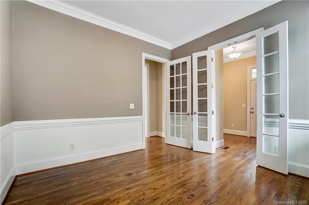718 Revival Row Fort Mill, SC 29708 - Photo 7 of 47 wooden floor in an empty room with a window
