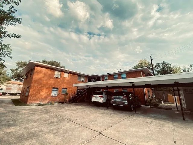 a car parked in front of a building