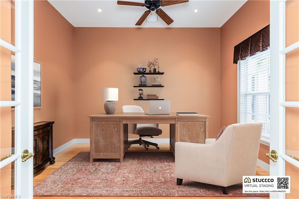 19930 Markward Crossing Estero, FL 33928 - Photo 8 of 40 Office area with wood-type flooring and ceiling fan