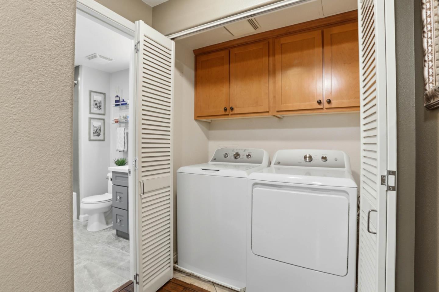 1310 Saddle Rack Street, Unit 314 San Jose, CA 95126 - Photo 25 of 43 a utility room with dryer and washer