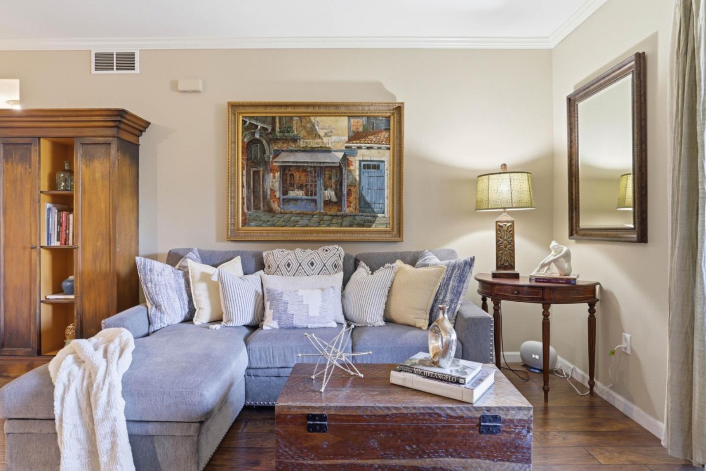 1310 Saddle Rack Street, Unit 314 San Jose, CA 95126 - Photo 3 of 43 a bedroom with a bed and wooden floor