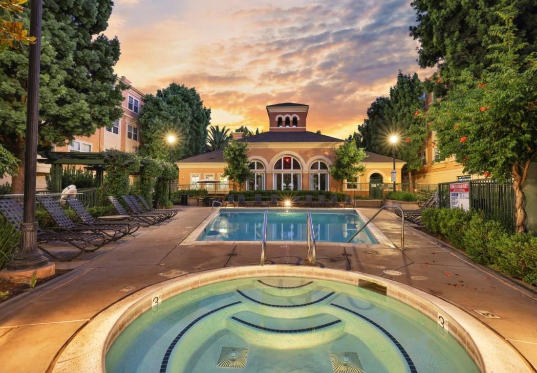 1310 Saddle Rack Street, Unit 314 San Jose, CA 95126 - Photo 35 of 43 a view of a swimming pool with outdoor seating and plants