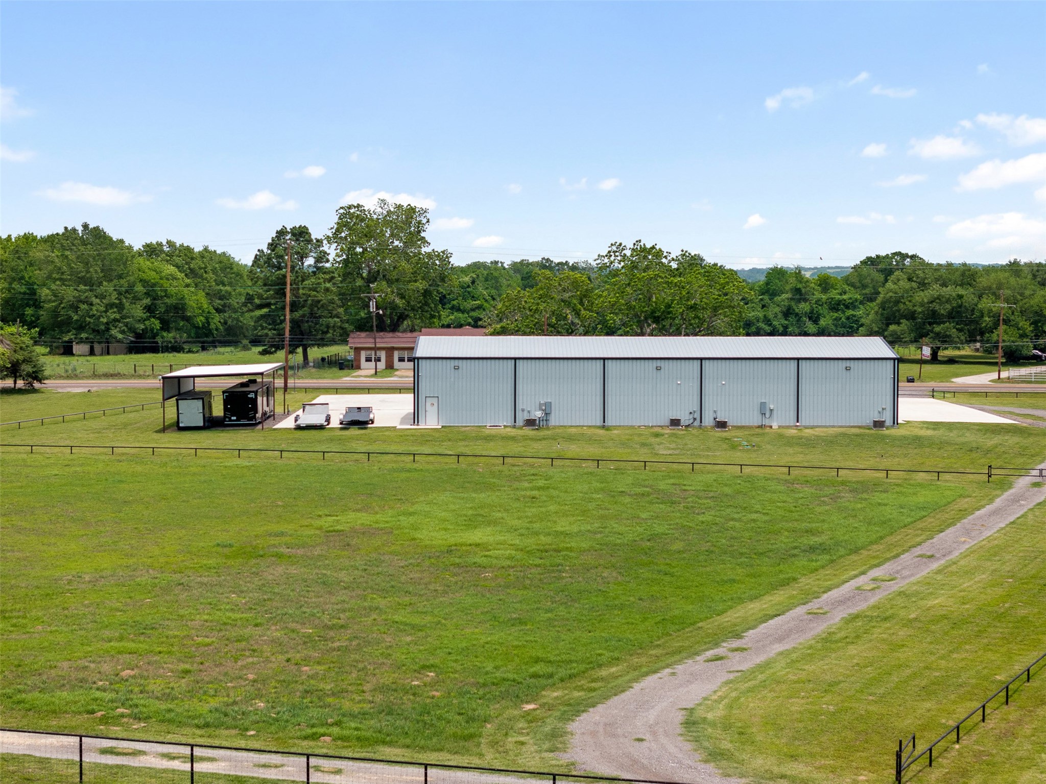 1229 Highway 36 Caldwell, TX 77836 - Photo 23 of 31 a house view with swimming pool in front of it