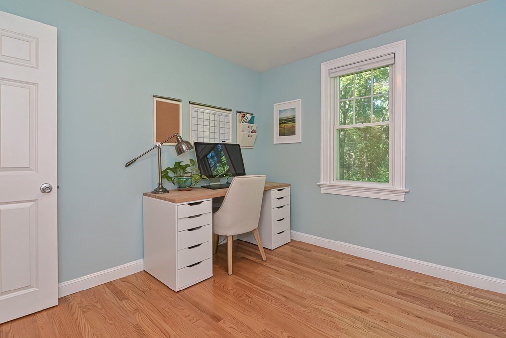 53 Warren Street Upton, MA 01568 - Photo 18 of 41 a view of a workspace with furniture and a window