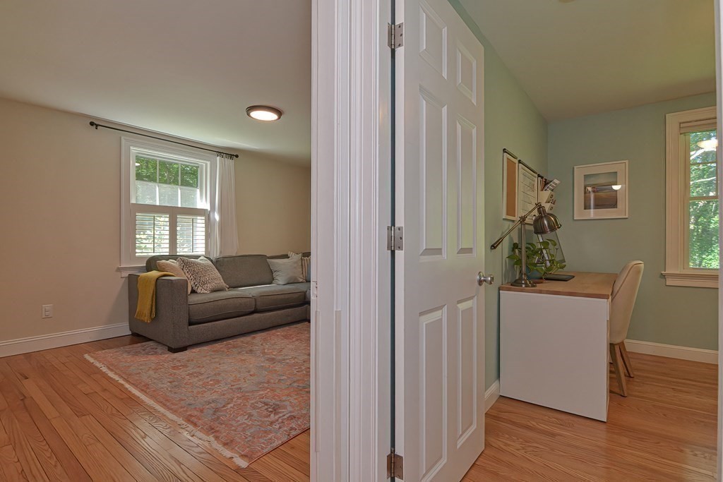 53 Warren Street Upton, MA 01568 - Photo 19 of 41 a living room with furniture and a window