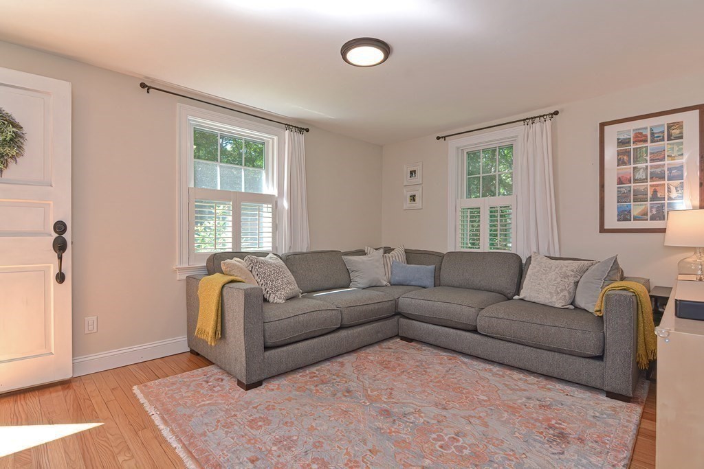 53 Warren Street Upton, MA 01568 - Photo 20 of 41 a living room with furniture and a window