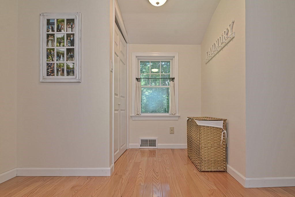 53 Warren Street Upton, MA 01568 - Photo 23 of 41 an empty room with windows and closet