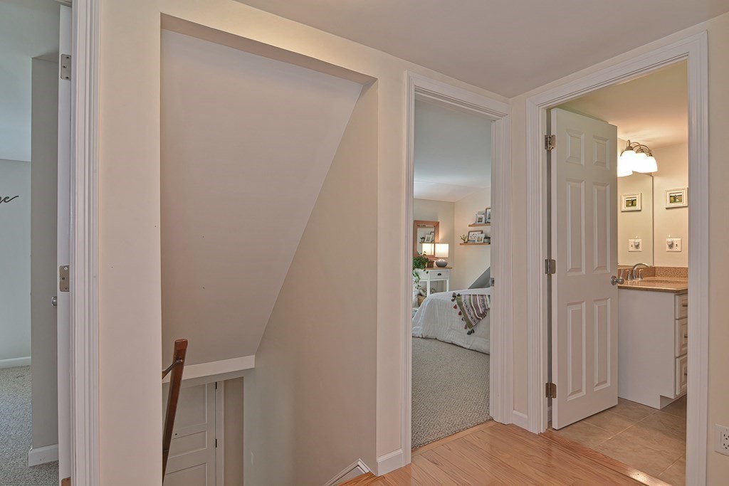 53 Warren Street Upton, MA 01568 - Photo 24 of 41 a view of a bathroom from a hallway