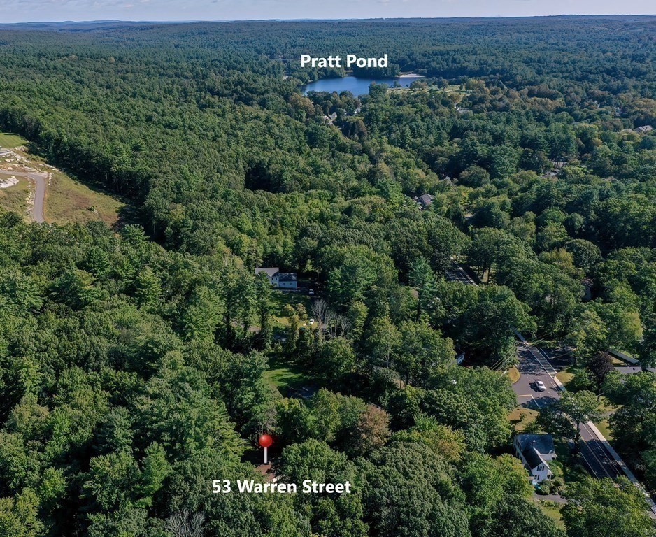 53 Warren Street Upton, MA 01568 - Photo 39 of 41 an aerial view of a house with a yard