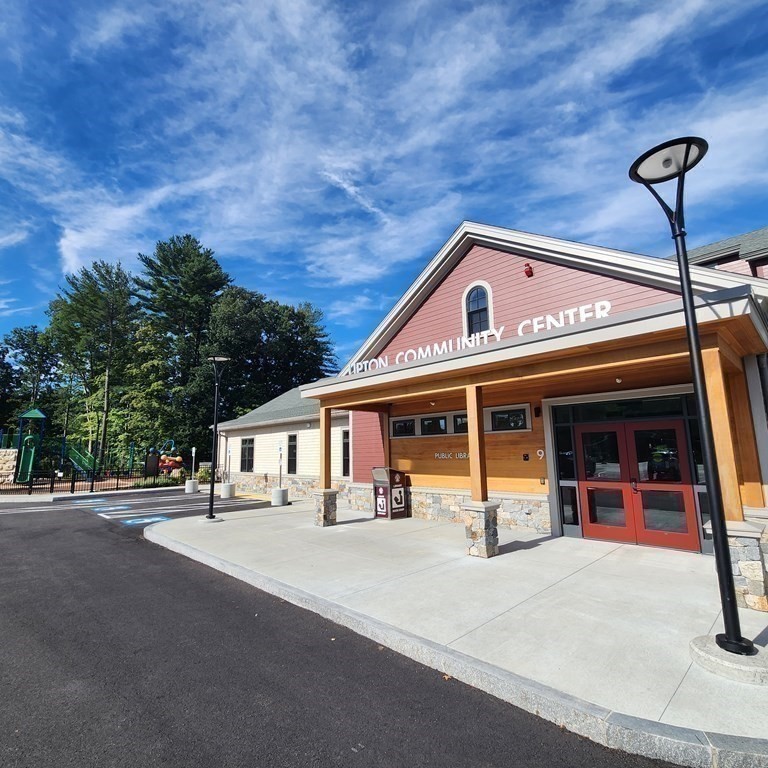 53 Warren Street Upton, MA 01568 - Photo 41 of 41 a front view of a building with street