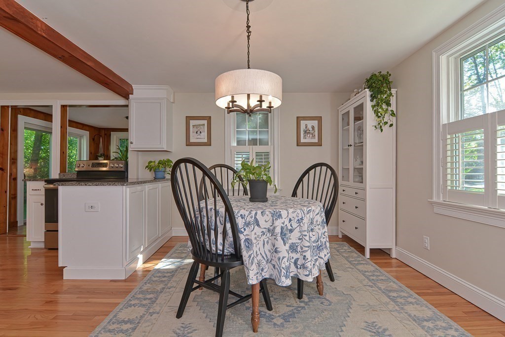 53 Warren Street Upton, MA 01568 - Photo 7 of 41 a view of a dining room with furniture window and wooden floor