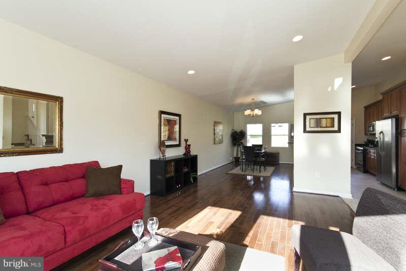 6101 Talles Road Baltimore, MD 21207 - Photo 21 of 21 Open Floor Plan with Living Room leading to Dining