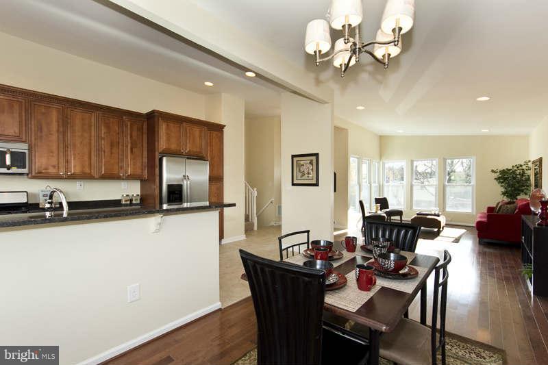 6101 Talles Road Baltimore, MD 21207 - Photo 3 of 21 Dining Room Opens to Kitchen and Living Room