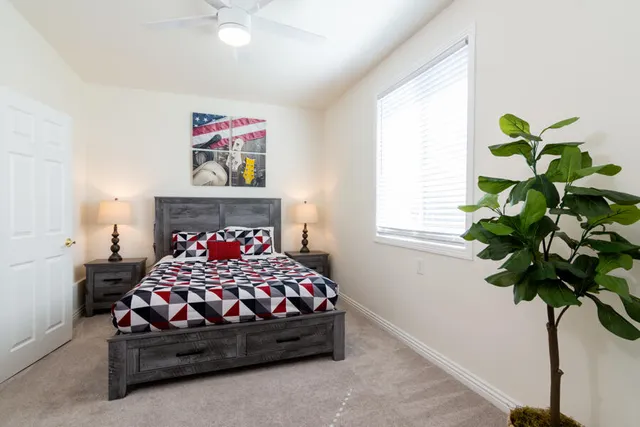 a view of livingroom with furniture and floor to ceiling window