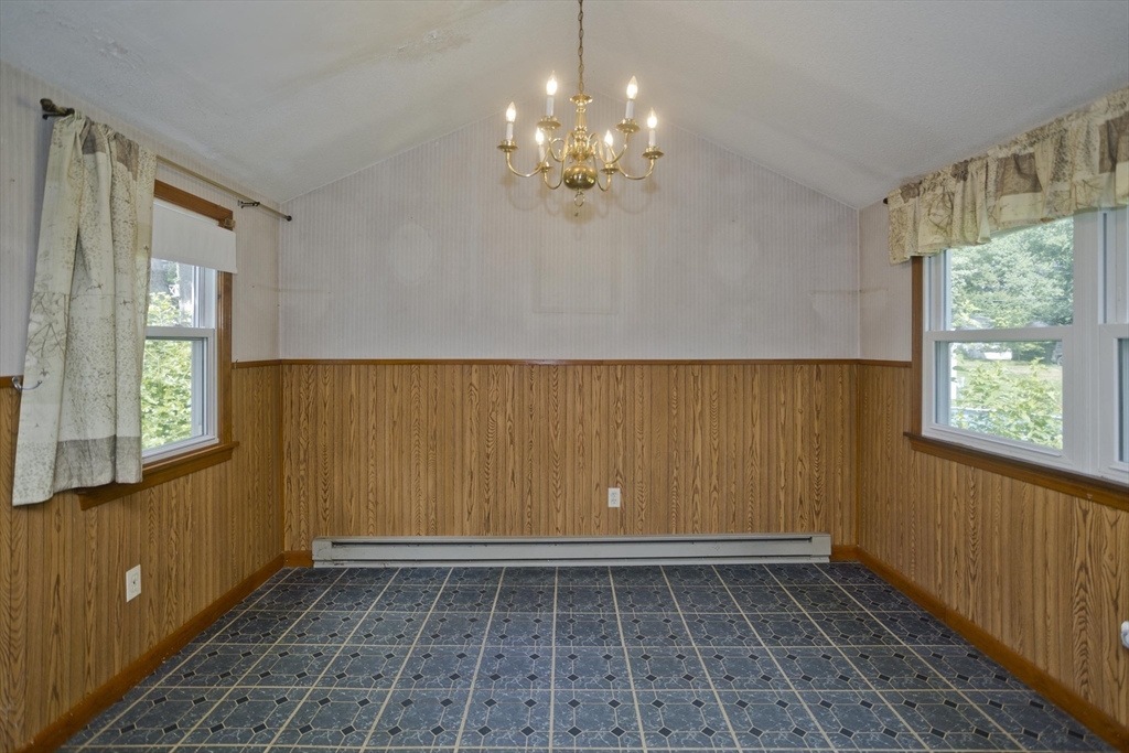 21 Bremen Street Springfield, MA 01108 - Photo 9 of 40 a view of an empty room with a window