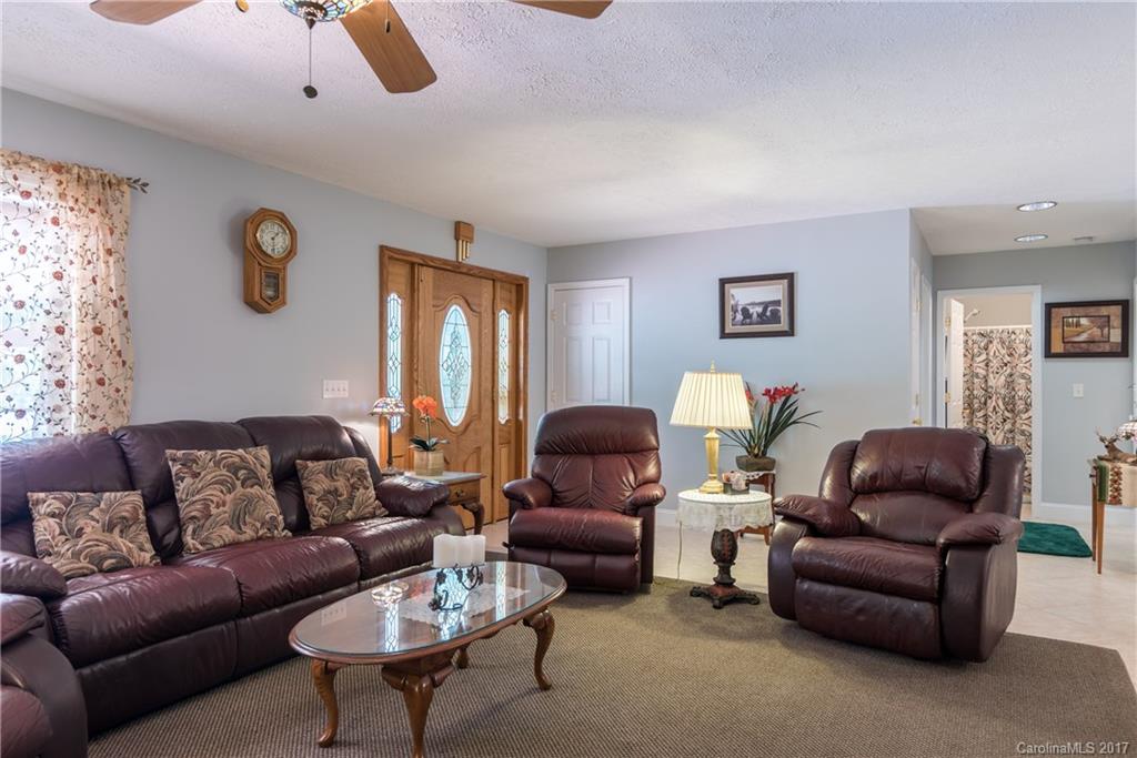 309 Edwards Road Mooresville, NC 28115 - Photo 14 of 24 a living room with furniture and a window