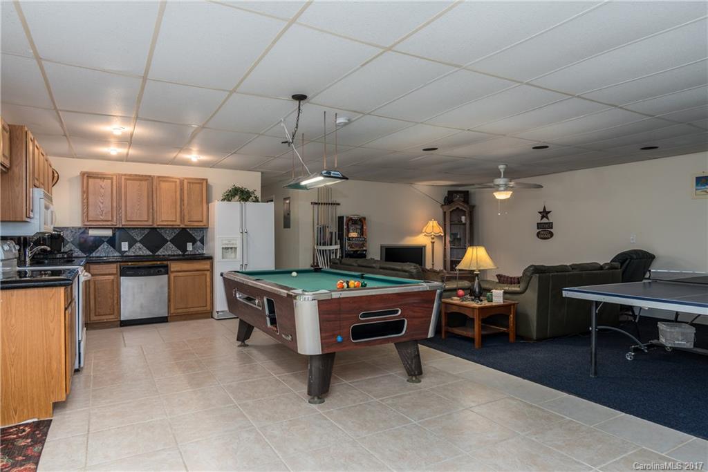 309 Edwards Road Mooresville, NC 28115 - Photo 22 of 24 a kitchen with a table and chairs in it