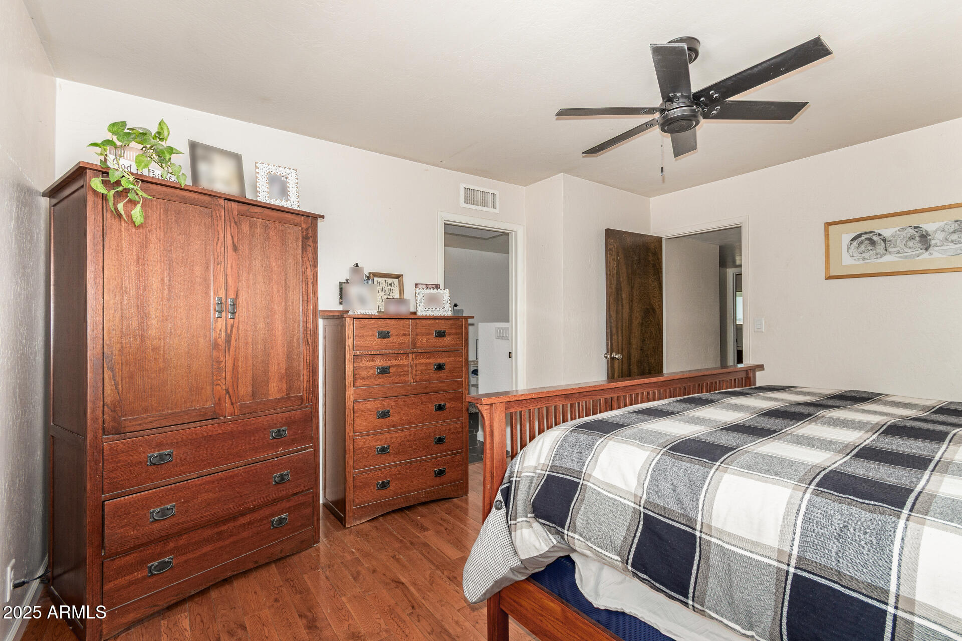 6901 South Palo Verde Road Buckeye, AZ 85326 - Photo 17 of 43 a bedroom with a bed and a closet