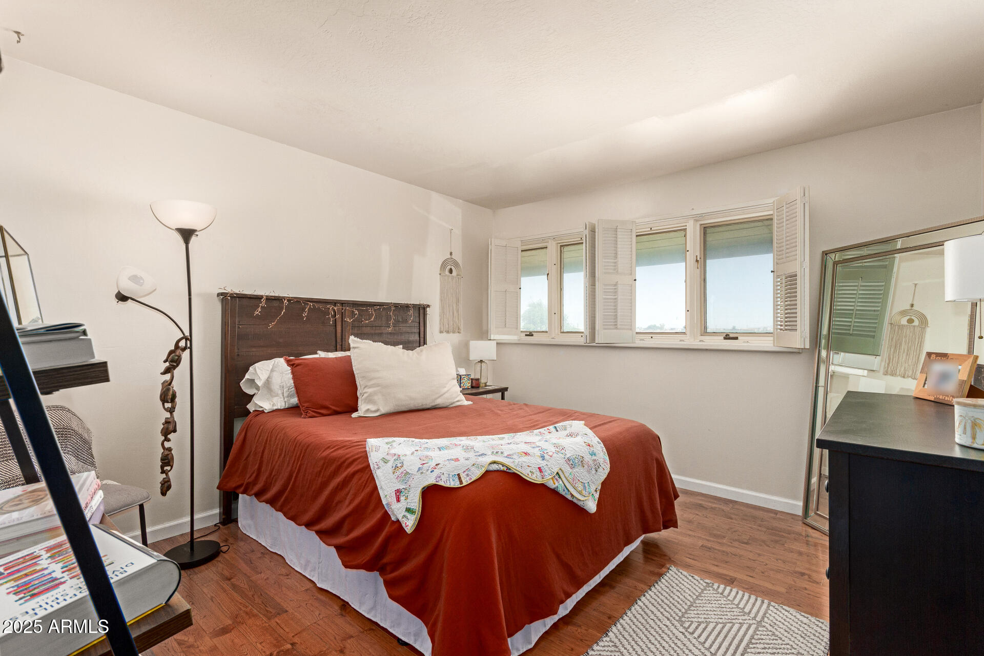 6901 South Palo Verde Road Buckeye, AZ 85326 - Photo 23 of 43 a bedroom with a bed and a window