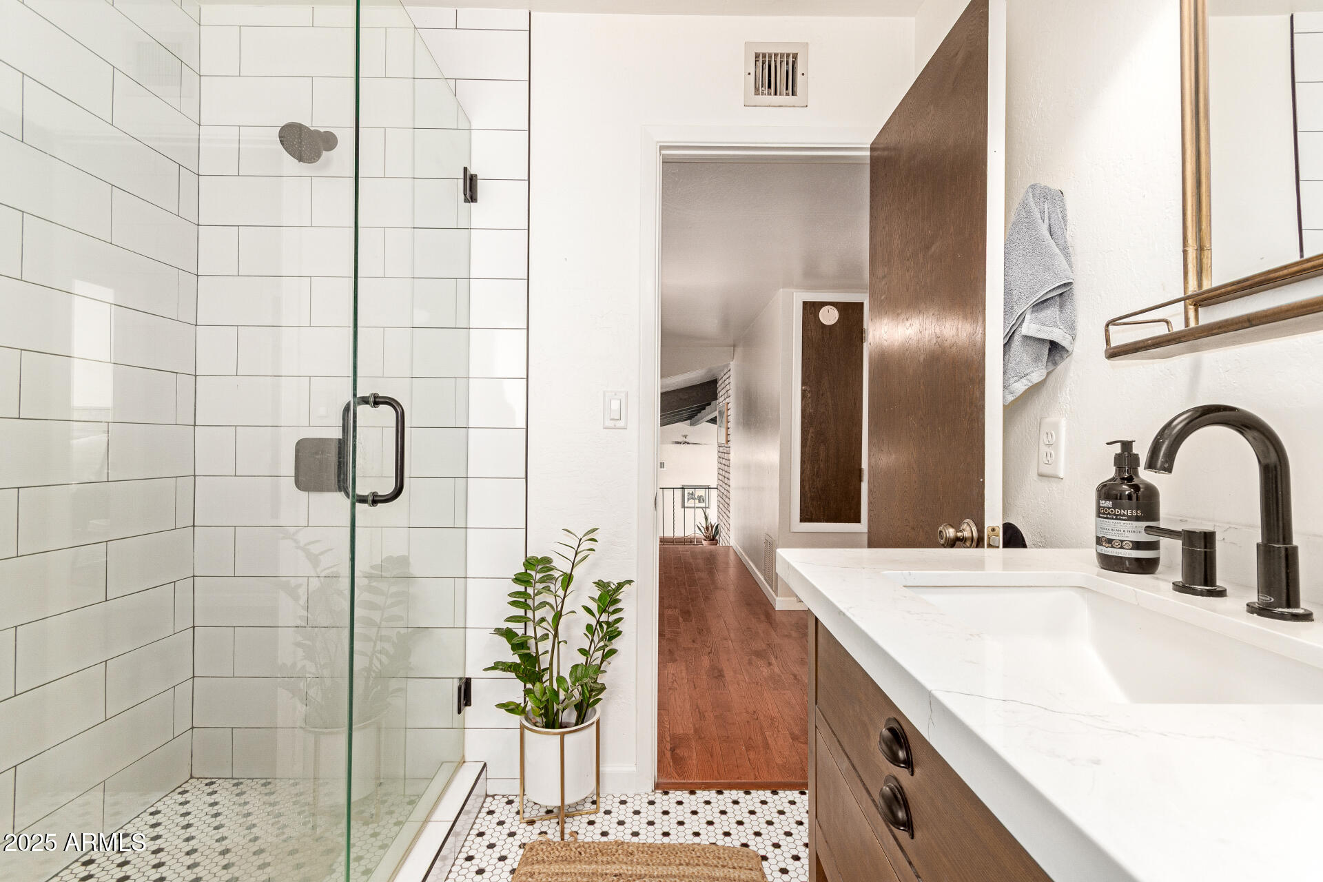 6901 South Palo Verde Road Buckeye, AZ 85326 - Photo 26 of 43 a bathroom with a sink and a shower