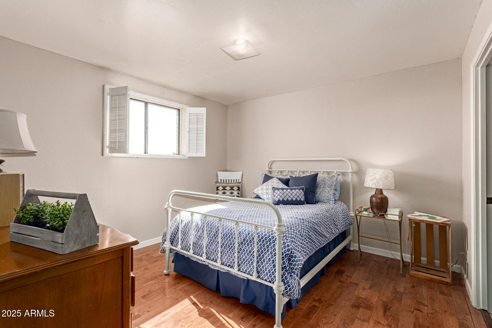 6901 South Palo Verde Road Buckeye, AZ 85326 - Photo 29 of 43 a bedroom with a bed and a flat screen tv