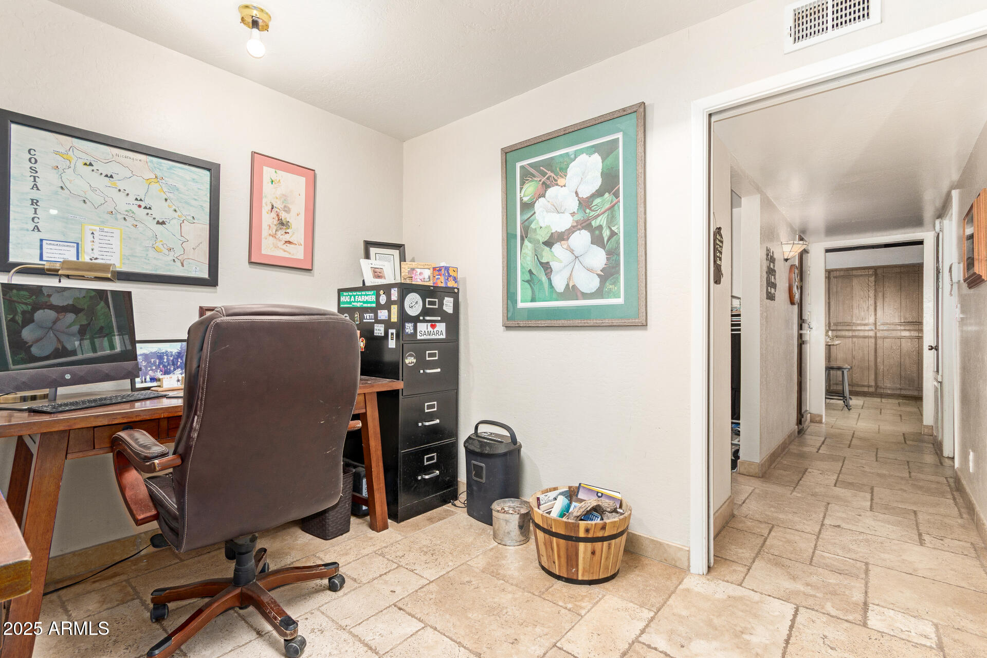 6901 South Palo Verde Road Buckeye, AZ 85326 - Photo 32 of 43 a view of a workspace with furniture and a window