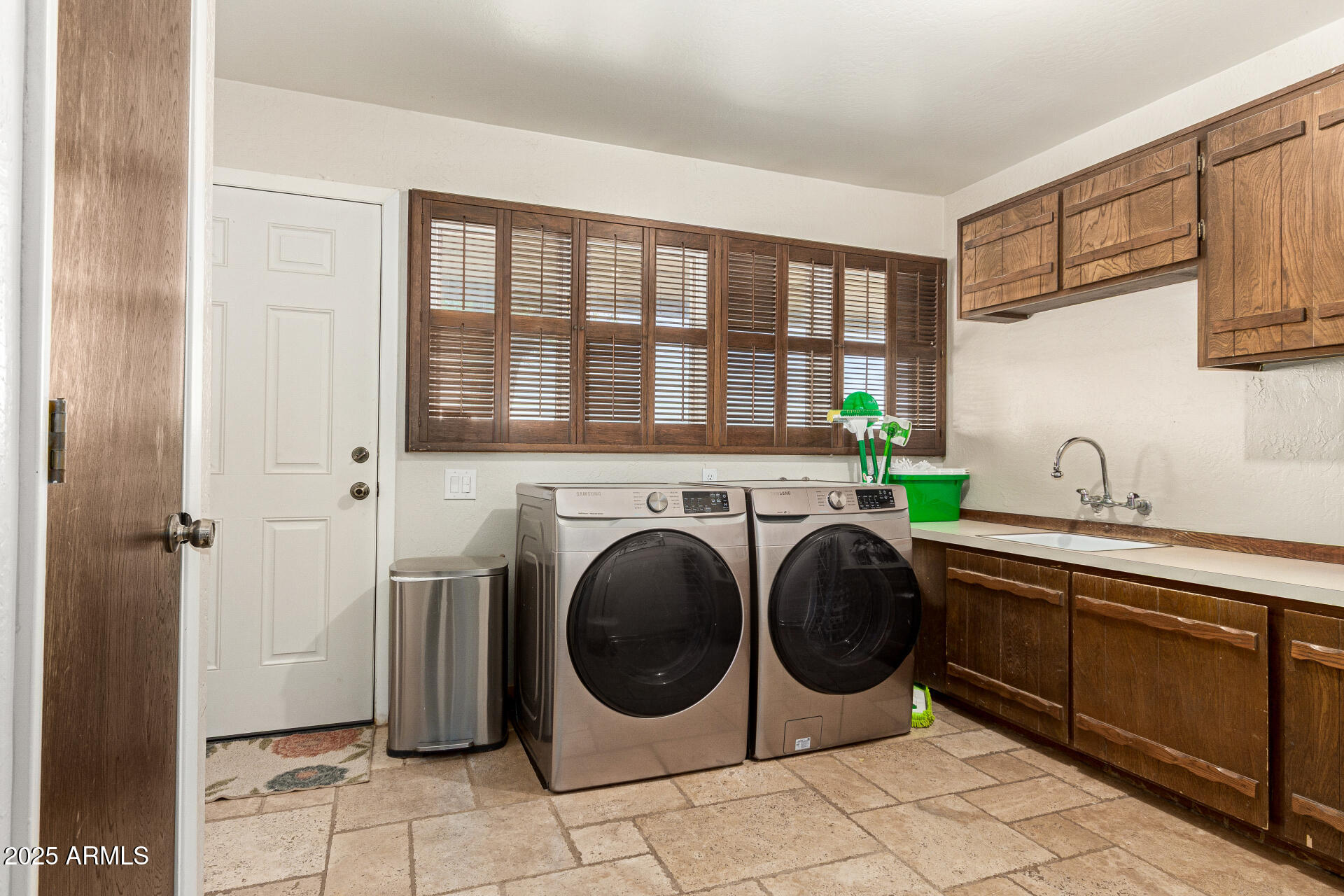 6901 South Palo Verde Road Buckeye, AZ 85326 - Photo 33 of 43 a utility room with sink dryer and washer