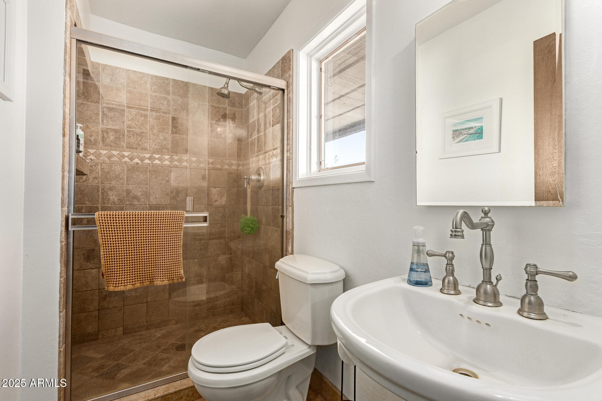6901 South Palo Verde Road Buckeye, AZ 85326 - Photo 34 of 43 a bathroom with a sink toilet and shower