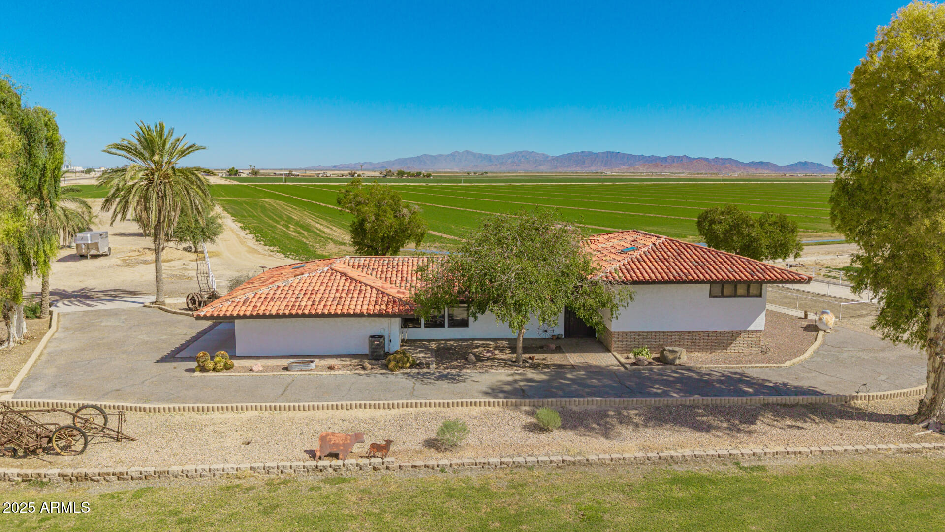 6901 South Palo Verde Road Buckeye, AZ 85326 - Photo 5 of 43 a view of a swimming pool with a yard