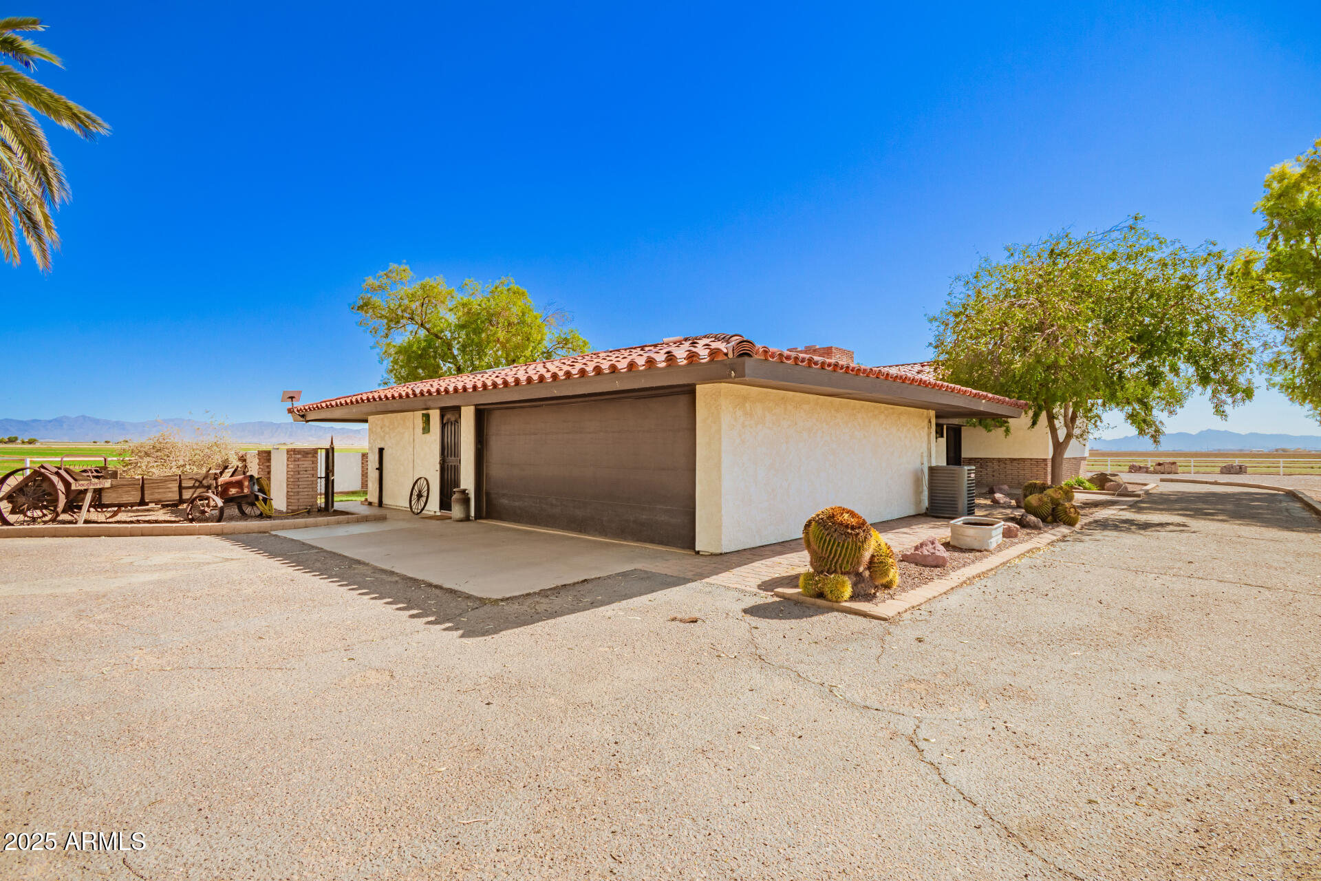 6901 South Palo Verde Road Buckeye, AZ 85326 - Photo 8 of 43 a front view of a house with a yard