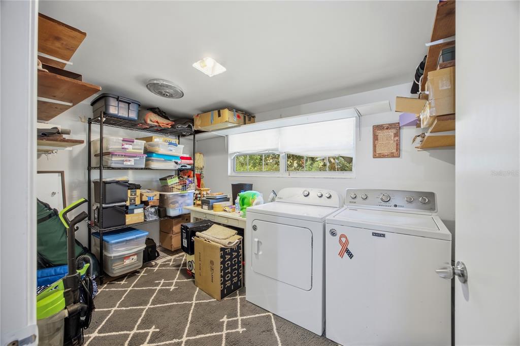 4123 Northwest 18th Place Gainesville, FL 32605 - Photo 15 of 36 a room with storage and utility