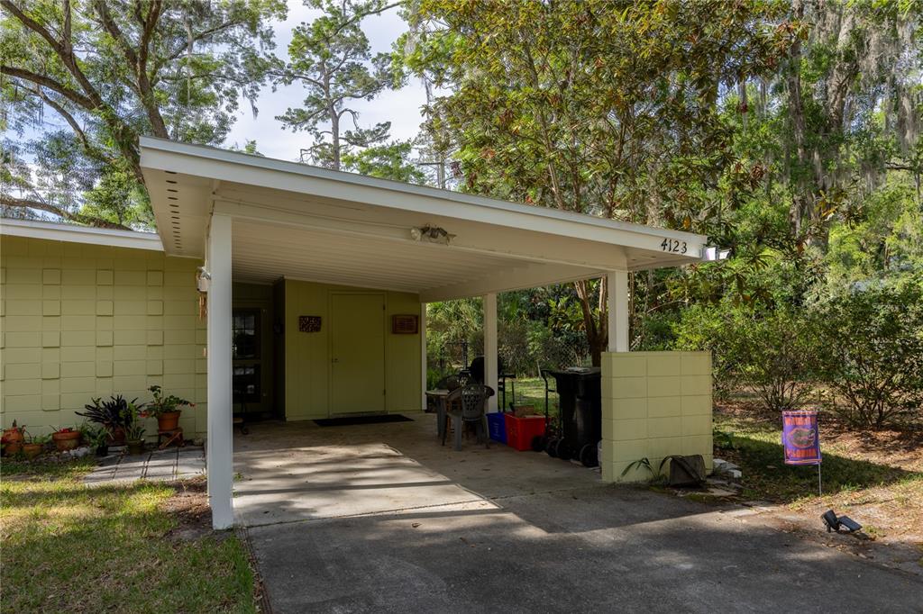 4123 Northwest 18th Place Gainesville, FL 32605 - Photo 30 of 36 a view of a house with garage