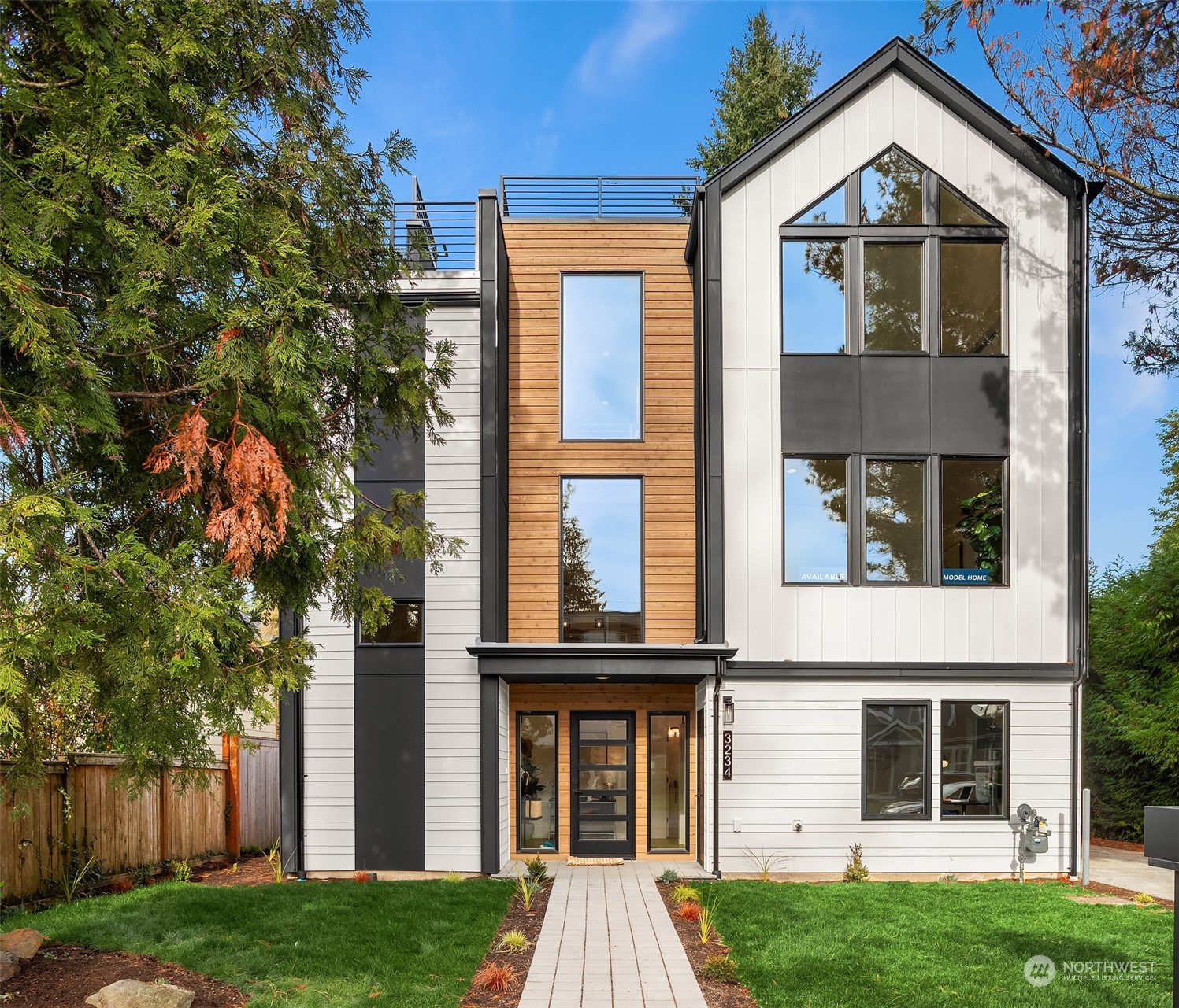 front view of a house with a yard