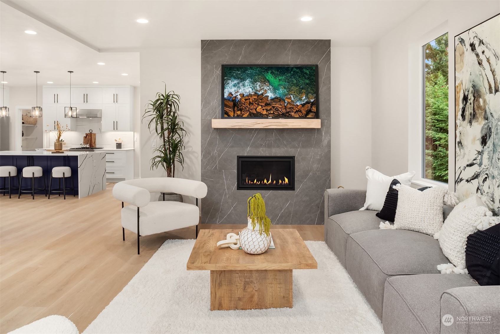3234 Northeast 88th Street Seattle, WA 98115 - Photo 11 of 23 a living room with furniture and a fireplace