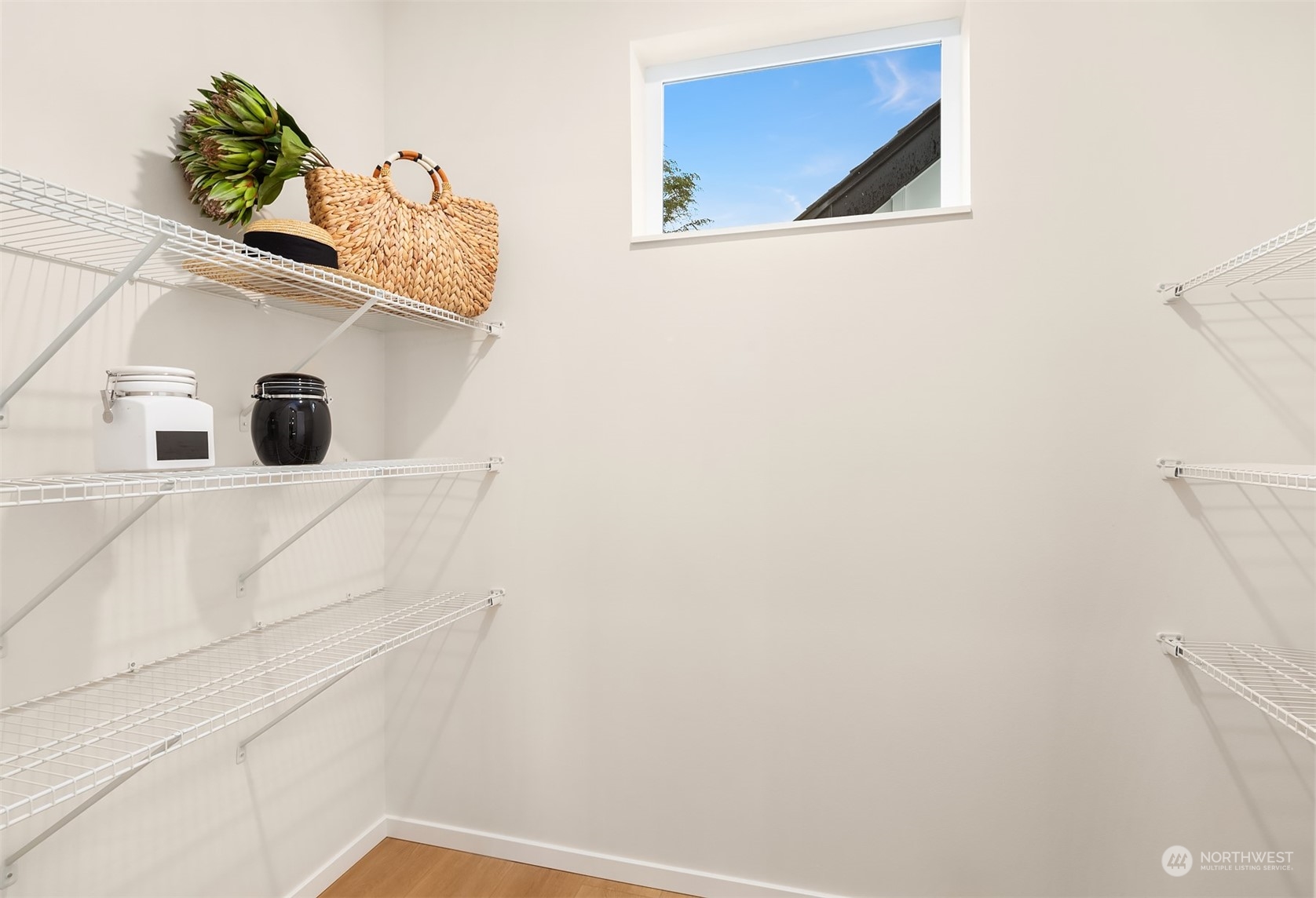 3234 Northeast 88th Street Seattle, WA 98115 - Photo 13 of 23 a bathroom with a sink and mirror