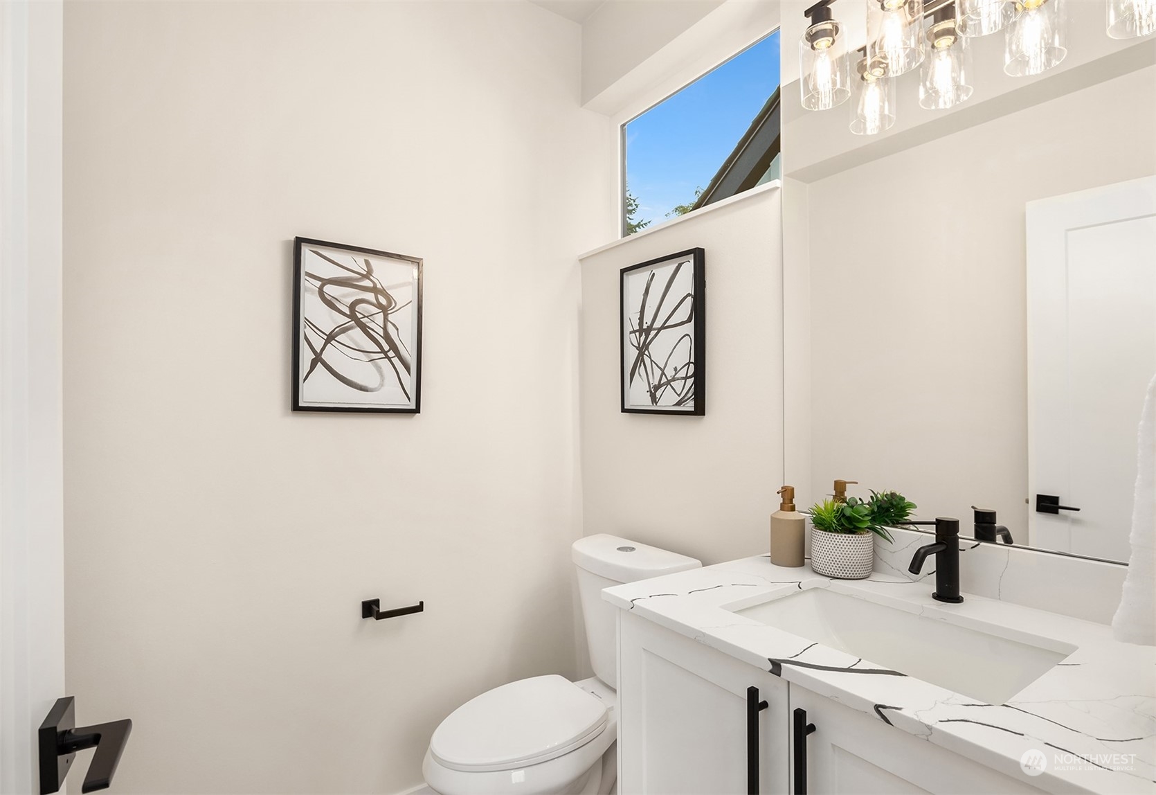 3234 Northeast 88th Street Seattle, WA 98115 - Photo 14 of 23 a bathroom with a sink and a toilet