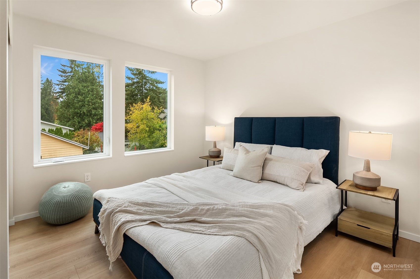 3234 Northeast 88th Street Seattle, WA 98115 - Photo 20 of 23 a bedroom with a bed and a window