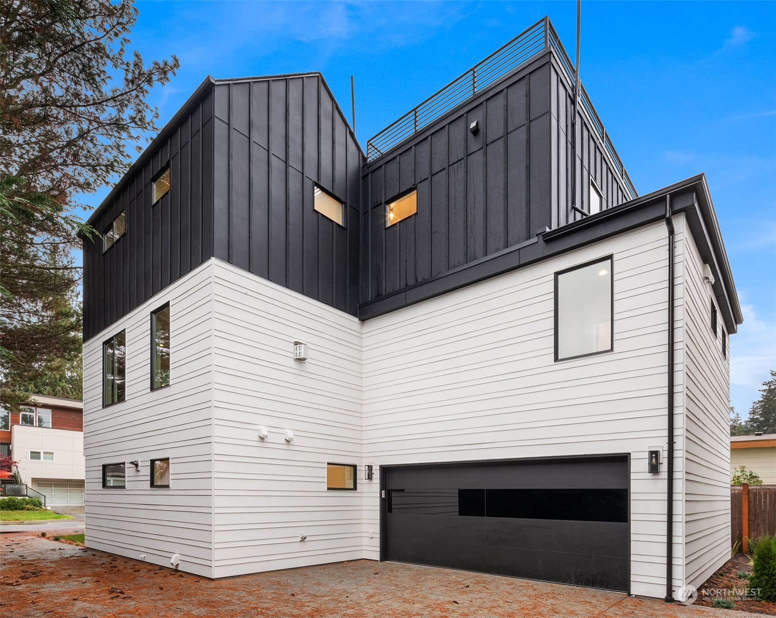 3234 Northeast 88th Street Seattle, WA 98115 - Photo 23 of 23 a view of a house with a deck