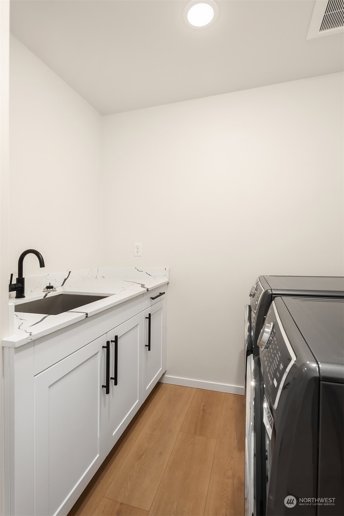 3234 Northeast 88th Street Seattle, WA 98115 - Photo 5 of 23 a utility room with dryer and washer