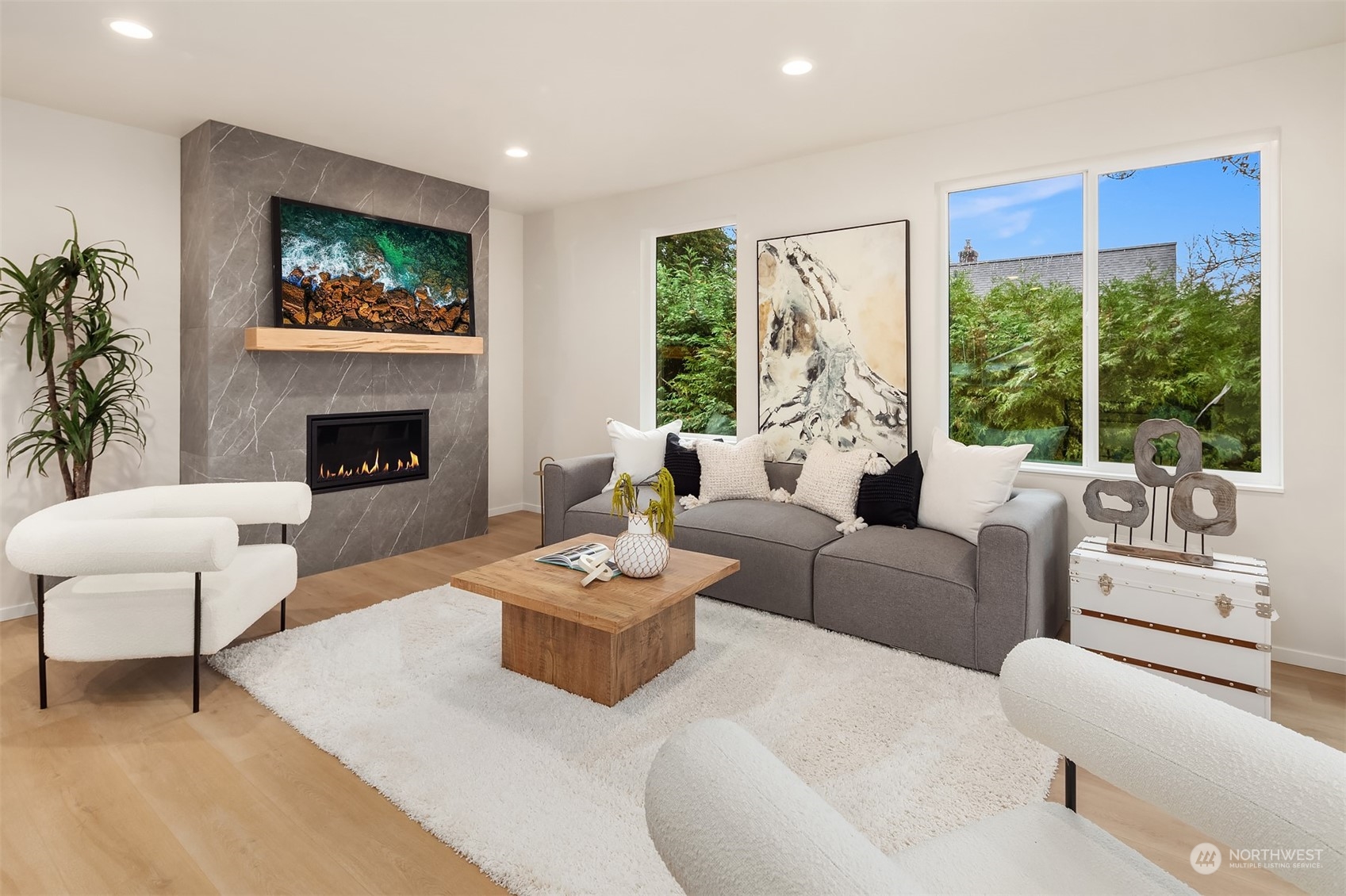3234 Northeast 88th Street Seattle, WA 98115 - Photo 10 of 23 a living room with furniture and a fireplace