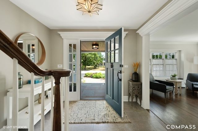 a very nice looking living room with a large window
