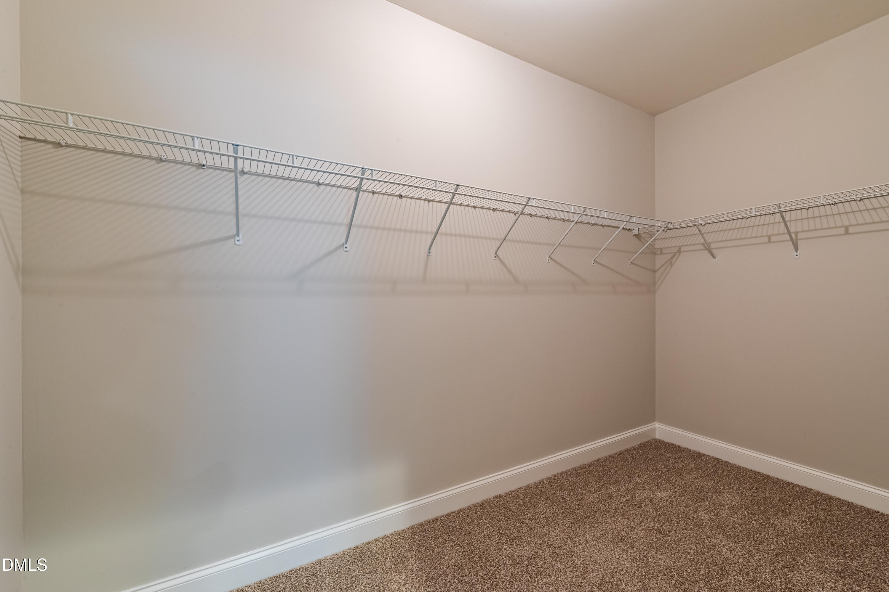 33 Juliette Drive Durham, NC 27713 - Photo 23 of 39 a view of a room with racks on the wall