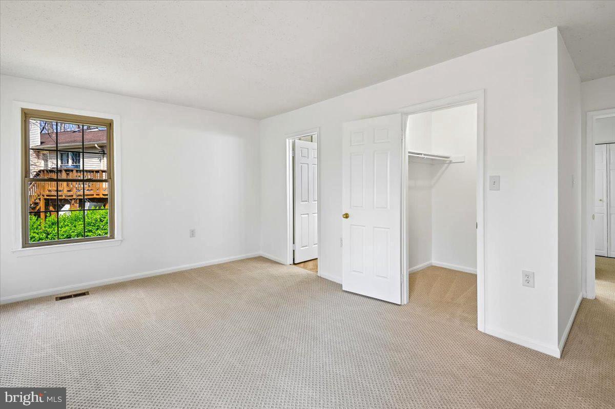 860 Woodmont Road Annapolis, MD 21401 - Photo 18 of 55 Primary Suite with Walk-in Closet